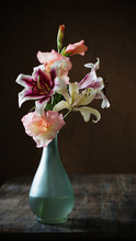 Still Life With Summer Flowers In Vase On Dark Background