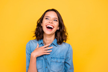 You are so funny. Portrait of cheerful positive funny funky girl hear joke laugh wear youth clothses isolated over yellow bright color background