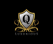Gold Shield Q Letter Logo. Gold Vintage Shield With Q Letter Prefect For Boutique, Hotel, Restaurant, Wedding And Other Elegant Business. 