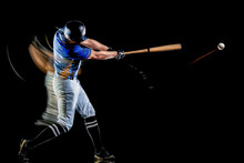 One Caucasian Baseball Player Man Studio Shot Isolated On Black Background With Light Painting Speed Effect