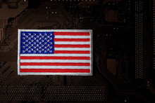 American Flag On Computer Circuit Board. - Security And Cybercrime Concept.