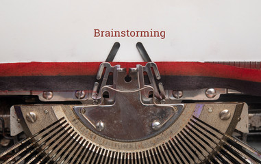 Fototapete - Text of brainstorming on paper with old Manual Typewriter top view, copy space