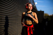 © BGStock72 - Young slim woman jogging in the dusk
