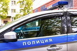 Fototapeta Miasto - Police car. Russian patrol car, the inscription police.