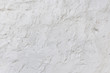 © Илья Подопригоров - Seamless white rough concrete wall texture background. cement wall. plaster texture. blank for the designer