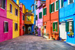 Street with colorful buildings in Burano island, Venice, Italy. Architecture and landmarks of Venice, Venice postcard
