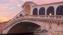 Venice Tourists Walk On Rialto Bridge Timelapse Day To Night Zoom Out