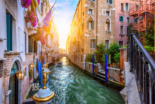 Narrow canal with bridge in Venice, Italy. Architecture and landmark of Venic...
