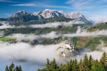 Poster - Hohenwerfen Castle in Austria. Foggy morning in Autumnal Season