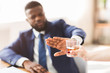 © Prostock-studio - Businessman saying no to glass of whiskey offered by colleague