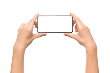 Poster - Young woman holding smartphone with blank screen in horizontal orientation
