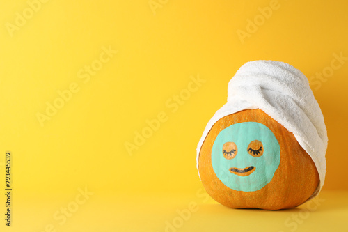 Download Pumpkin With Facial Mask And Towel On Yellow Background Copy Space Buy This Stock Photo And Explore Similar Images At Adobe Stock Adobe Stock PSD Mockup Templates