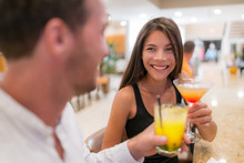 Couple Going Out On Date At Restaurant Bar Toasting Cocktails Alcoholic Drinks At Night. Romantic Dating Lifestyle Youn People.