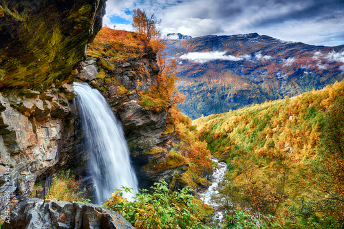 Cuadros en Lienzo Beautifull waterfall in autumn scenery
