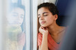 © Westend61 - Teenage girl traveling alone by train, sleeping
