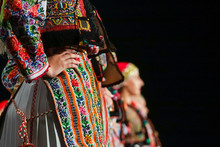 Close Up On Detail Of Young Romanian Female Dancer Traditional Folkloric Costume. Folklore Of Romania