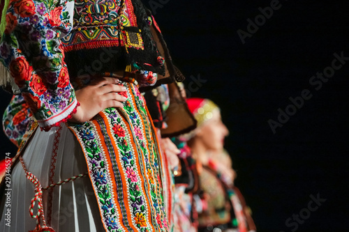 Cuadros en Lienzo Close up on detail of young Romanian female dancer traditional folkloric costume