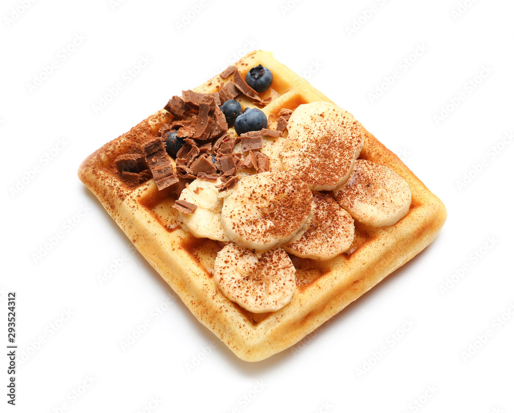 Tasty waffles with banana and chocolate on white background