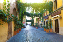 Old Street In Trastevere, Rome, Italy. Cozy Old Street In Trastevere Neighborhood Of Rome, Typical Architecture And Landmark Of The City.