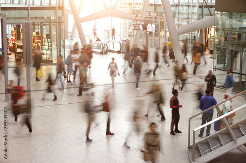 Cuadros en Lienzo Blurred travelers and people in motion in Central Station or Airport