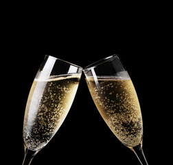 Wall Mural - Two glasses of champagne toasting isolated