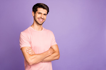 Wall Mural - Portrait of his he nice attractive handsome cheerful cheery content bearded guy freelancer wearing pink tshirt folded arms isolated over violet purple lilac pastel color background