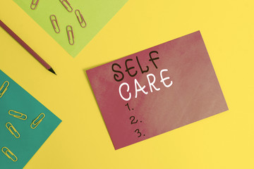 Wall Mural - Word writing text Self Care. Business photo showcasing Give comfort to your own body without professional consultant Blank paper sheets message pencil clips binders plain colored background