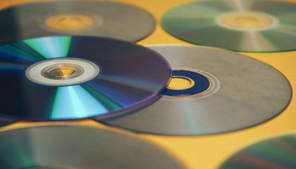 Aufkleber - Close up Beautiful Old dirty CDs,DVD on yellow background.