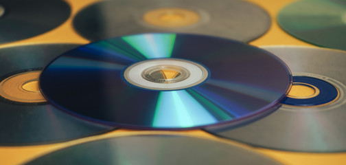 Aufkleber - Close up Beautiful Old dirty CDs,DVD on yellow background.