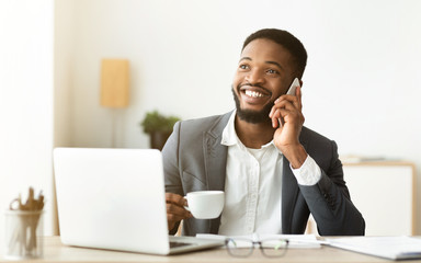 Poster - Office employee talking on mobile phone during coffee break