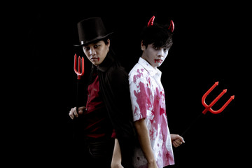 Asian men in costume hell, evil and wizard with fight on black background.