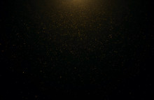 Abstract Background Of Flickering Gold Particles And Light Flare