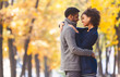 © Prostock-studio - Sweet black couple hugging in autumn park