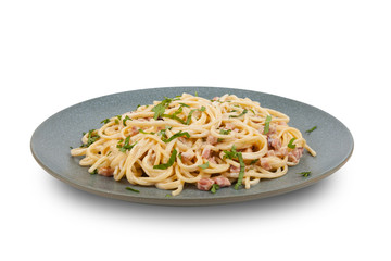 Pasta Carbonara. Served on a gray plate. White background. Pack shot.