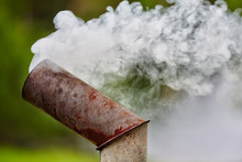 Smoke From An Old Rusty Metal Pipe From A Street Stove, Hearth