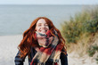 © contrastwerkstatt - Joyful happy young redhead woman