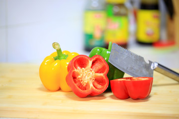 Poster - The color pepper is on the cutting board