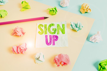 Poster - Handwriting text Sign Up. Conceptual photo use your information to register in website team college or blog Colored crumpled papers empty reminder blue yellow background clothespin