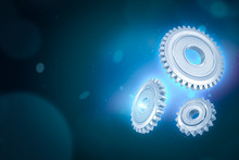 3d Close-up Rendering Of Three Gear Wheels On Blue Gradient Blur Bokeh Background With Copy Space.