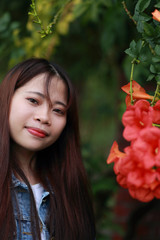 portrait of young woman at botanical garden in japan