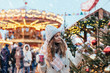 © Alena Ozerova - Girl walking on Christmas Market on Red Square in Moscow