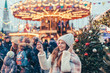 © Alena Ozerova - Girl walking on Christmas Market on Red Square in Moscow