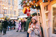 © Alena Ozerova - Girl walking on Christmas Market on Red Square in Moscow