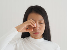 Eye Socket Pain In Asian Woman Cause From The Infection Of The Sinuses Cavities Or Migraines And Cluster Headaches Use For Health Care Concept.