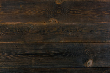 Grunge background of old brown wooden plank. Horizontal stripes