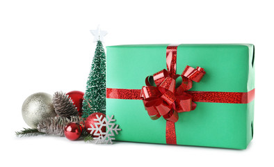 Christmas gift box with decoration on white background