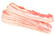 Rasher or smoked sliced bacon ready for cooking. Four pieces of pork belly, isolated on a white background, close-up.