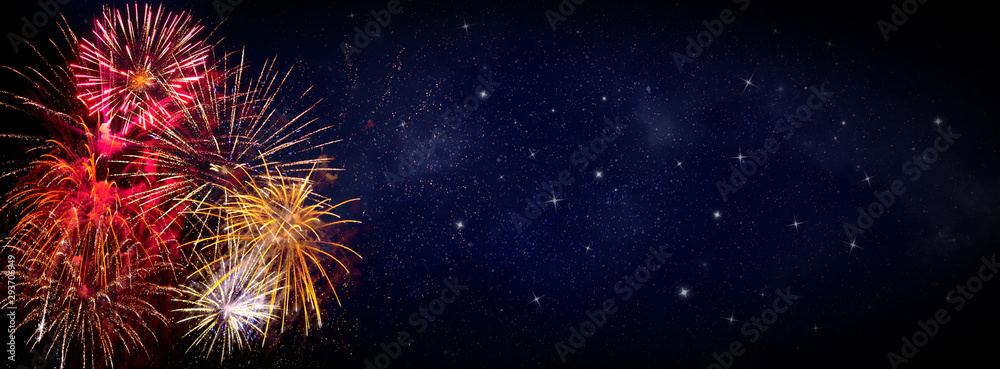 Fireworks on blue background with stars and space for text - obrazy, fototapety, plakaty 