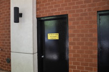 Black Door With Gas Meter Room No Storage Permitted Sign