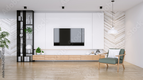 Tv Cabinet And Display With Wood Flooring And Green Chair